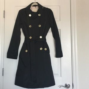 Kate Spade New York double- breasted trench coat.